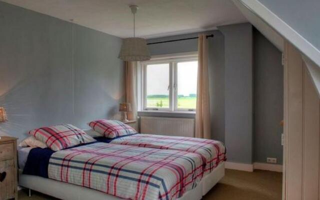 Spacious Farmhouse in IJzendijke with Garden