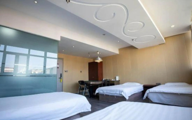Xincheng Yangguang Business Apartment