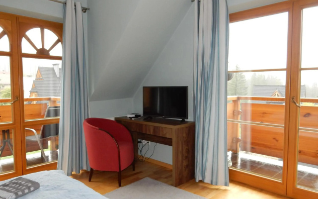 Domek za Strugiem - pokoje i apartamenty