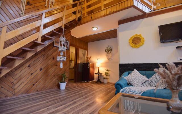 Swiss Cottage by Dumnu Homes next to Kangna Ranaut's house