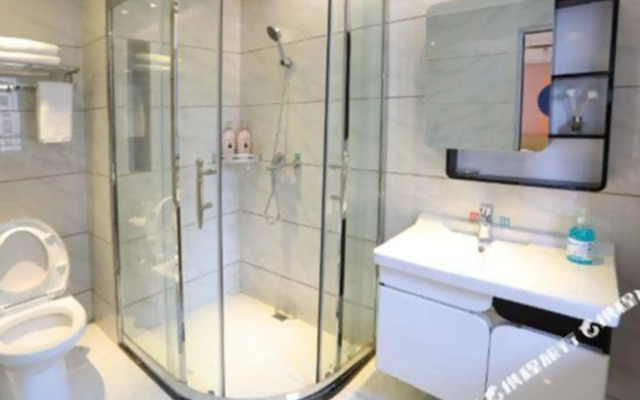 Manfei Theme Apartment (Meizhou wanda plaza Branch)