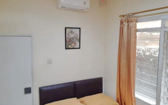 Spot On 3988 Kost Carmelia Baranangsiang Syariah