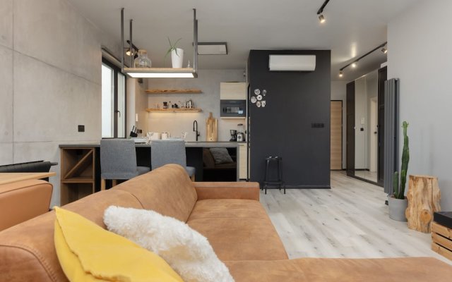 Industrial Bemowo Apartment by Renters