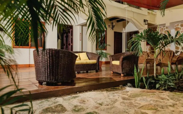 hotel y hostal nojoch che