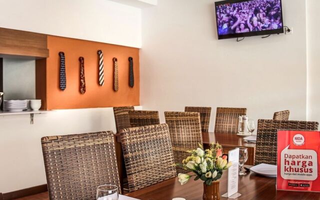 Ten House Guest & Resto by RedDoorz