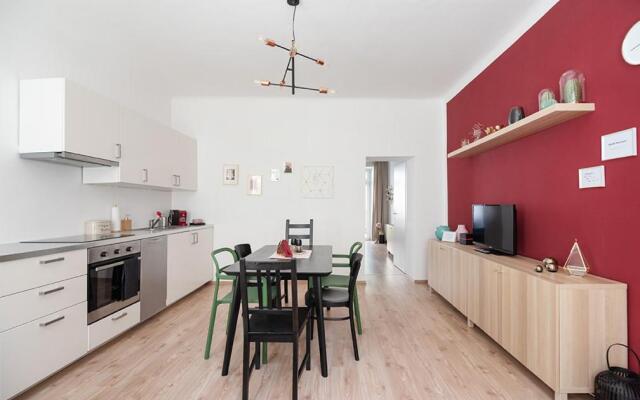 Colorful Apartment Facing Green Courtyard