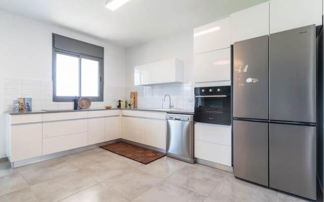 Vibrant Seaside Stay with Balcony by Sea N' Rent