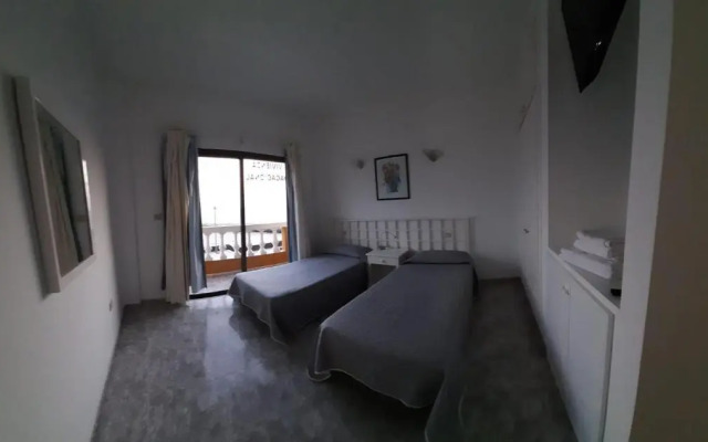 VV 121 con Balcón en primera línea de mar