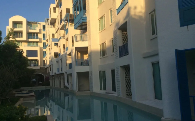 The Che Pool Access Beachfront Condo by Away