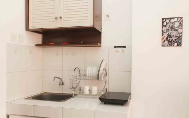 Chic and Cozy Studio at Riverview Jababeka Apartment