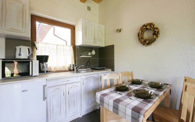 Quaint Holiday Home in Gleznowo With Parasol