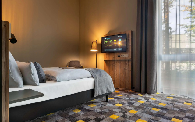 Отель Holiday Inn - the niu, Timber Esslingen, an IHG Hotel