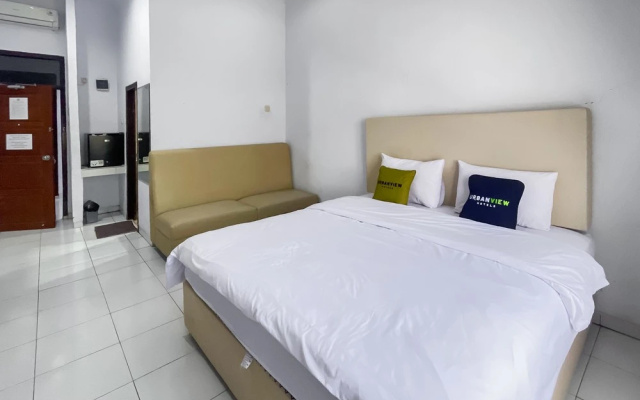 Urbanview Hotel Grand Seven One Kota – Guest Rooms – Manna