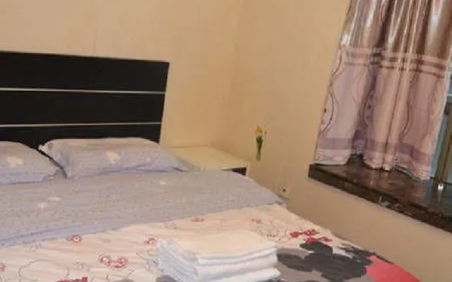 Xinyage Apartment