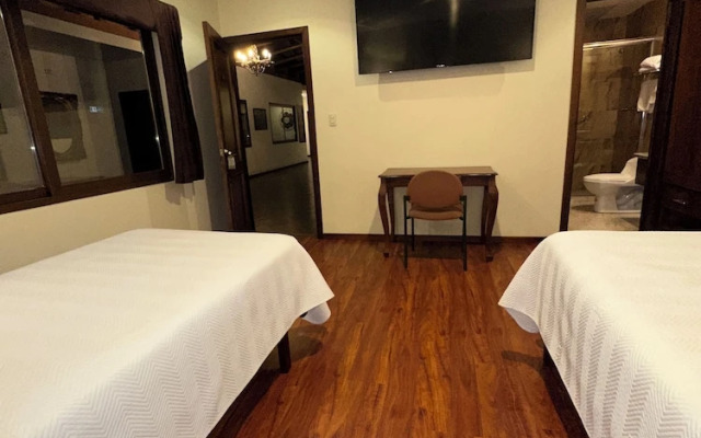 Hotel & Suites El Quijote