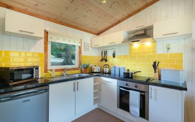"catkin Lodge set in a Beautiful 24 Acre Woodland Holiday Park"