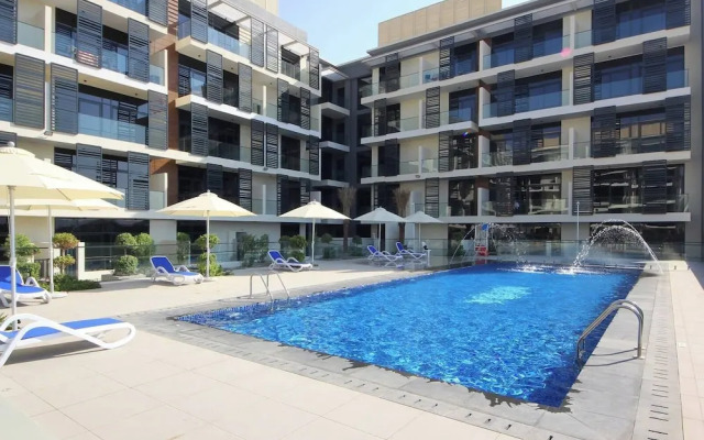 Manzil-Stylish 1BR with Maid room in JVC