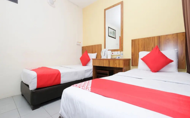 OYO 89877 Sun Triang Hotel