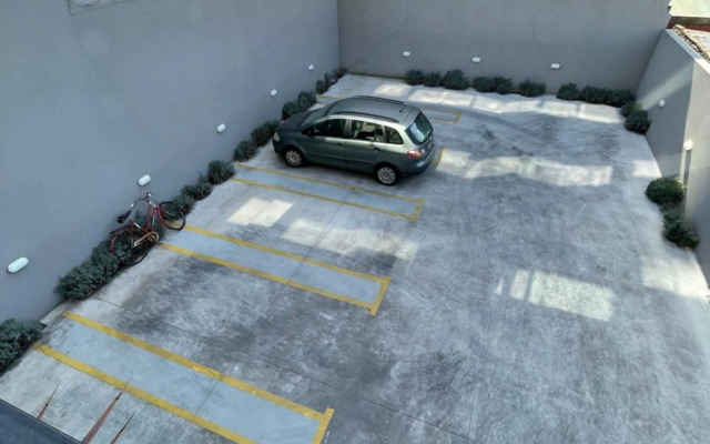 Departamento Moderno - Equipado y Con Cochera Privada