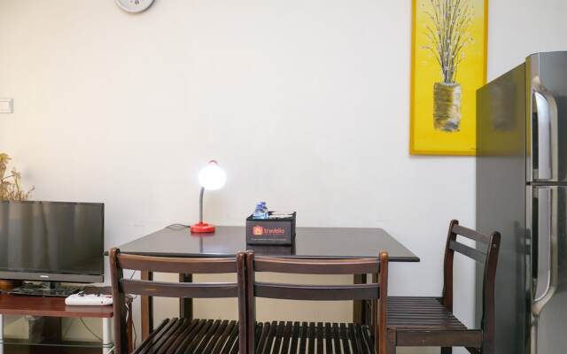 Clean and Homey 1BR at Puri Garden Apartment