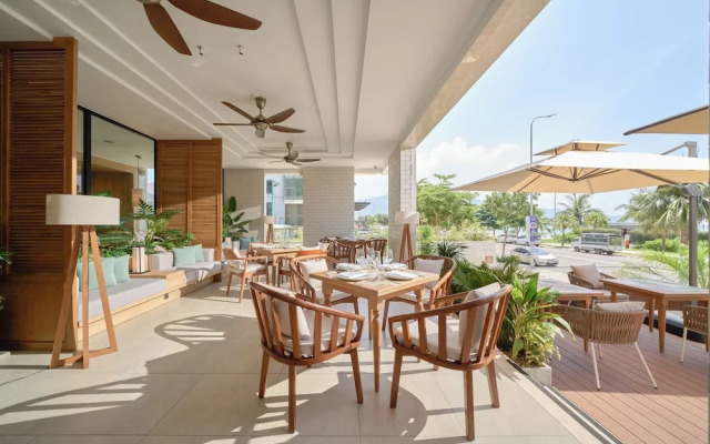 Signature By M Village Beachfront Hotel