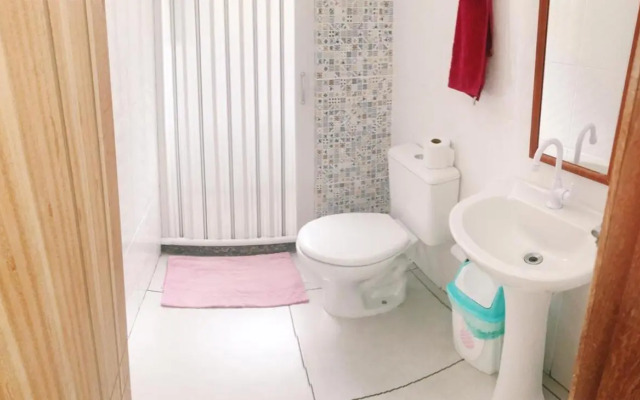 Suíte com cozinha no quintal da casa