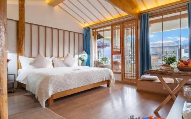 Corner encounter Love Inn (Shuhe Ancient Town Feihua Touch water folk performance Bar shop) – Guest Rooms – Lijiang