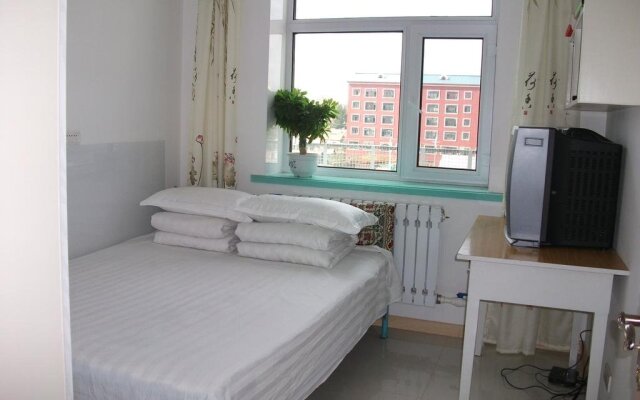 Mengxing Home Inn