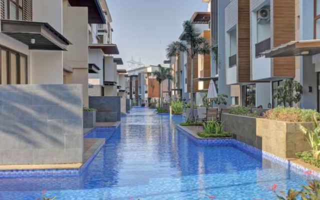 Relax and Homey at 1BR Asatti Garden House Apartment By Travelio – Pool – Legok