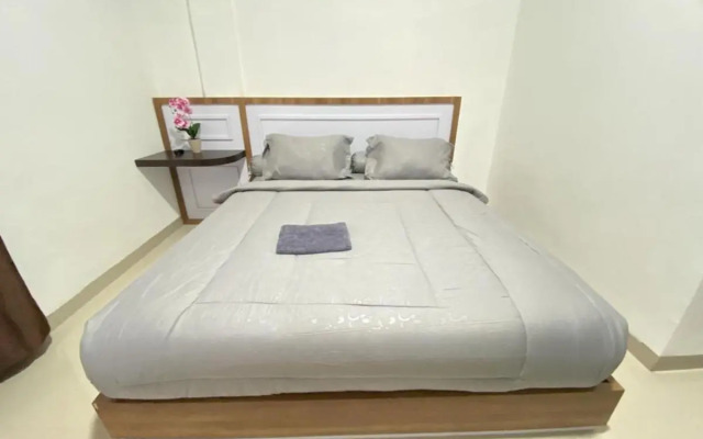 MJ Guest House Pusat Kota Malili Mitra RedDoorz