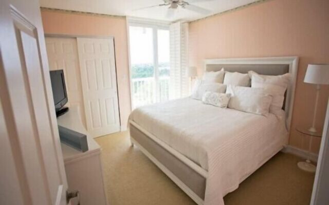 Cozy Condo with Gorgeous View of the Beach and Gulf by RedAwning