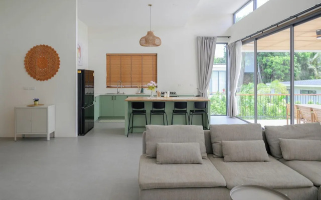 Tropical Poolside Retreat by Sea N' Rent