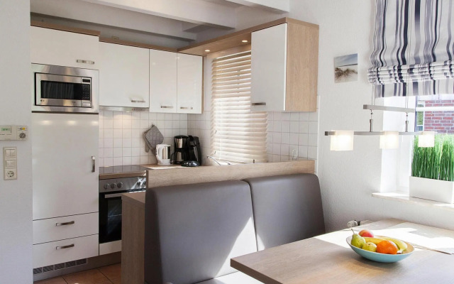 Apartment in Burhave with a shared pool