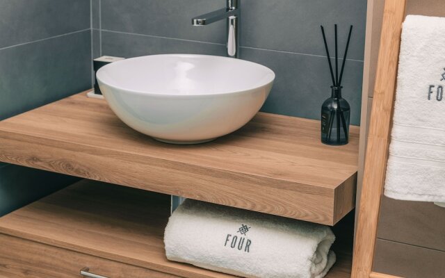 Four - Acanfora Suites