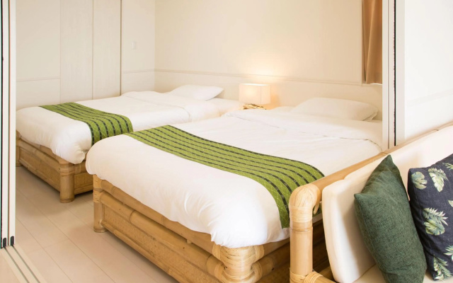 Costa Bella Condominiun Resort – Guest Rooms – Motobu