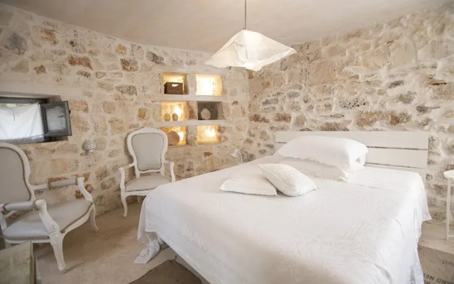 Trullo e Lamie Fiabeschi con Piscina Privata