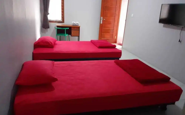 Nabila Syar i Guesthouse by ZUZU