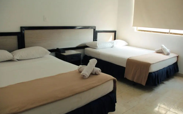 Hotel Axis Inn By GEH Suites