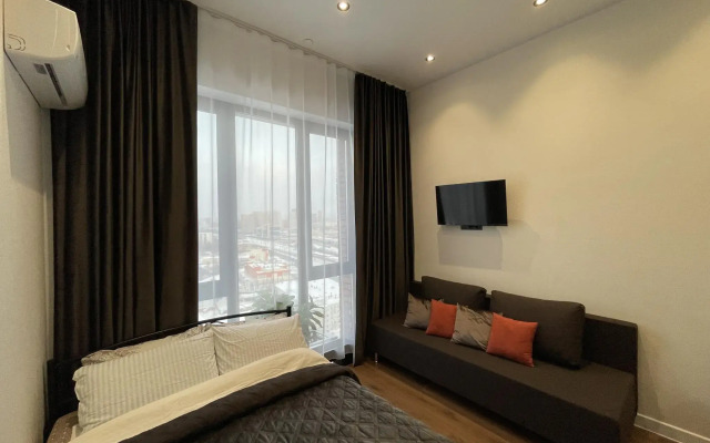 Апартаменты на проспекте Окружной 10Б