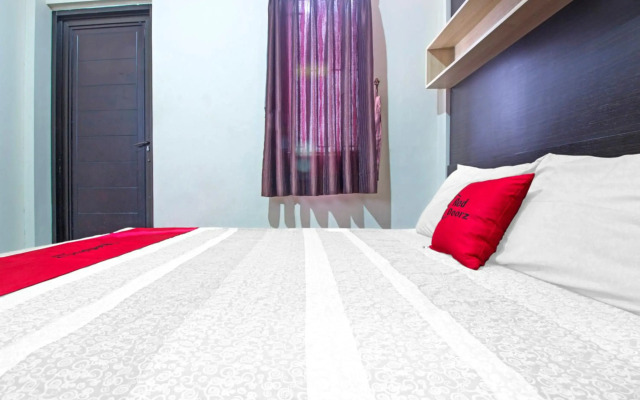 RedDoorz Plus near Isola UPI