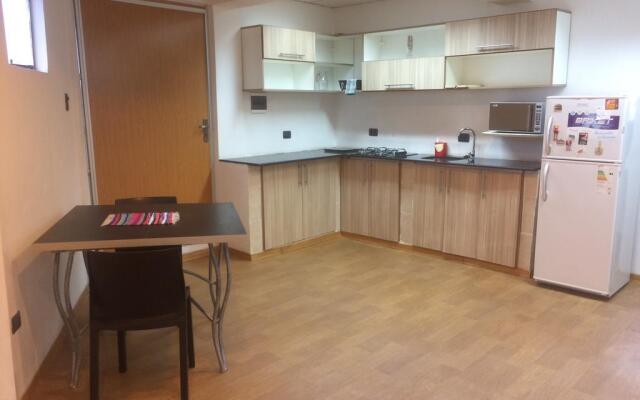 Acosta Ñu Apart Hotel