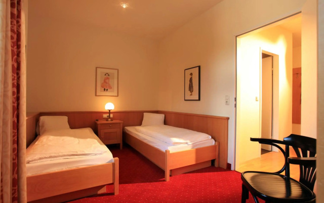 Romantik Residenz Ferienwohnungen Hotel Im Weissen Rössl