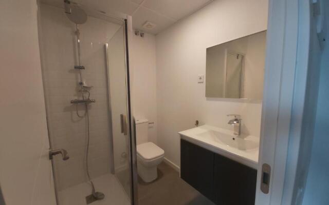 Acero y Piedra Apartamentos con jardín