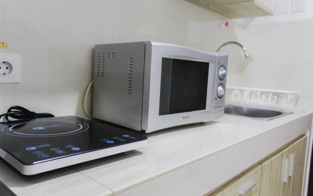 Bright Studio Apartment at Springwood Residence