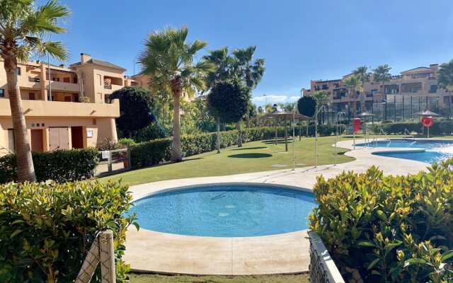 Casares Beach Golf Apartment With Private Garden and Pool Access