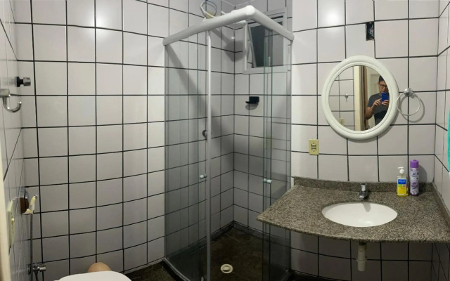 Apartamento Guarapari pé na areia com Wi-Fi e Garagem