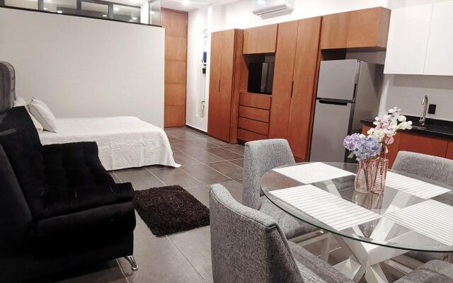 Moderno loft, a 1/2 cuadra de malecón, con alberca.