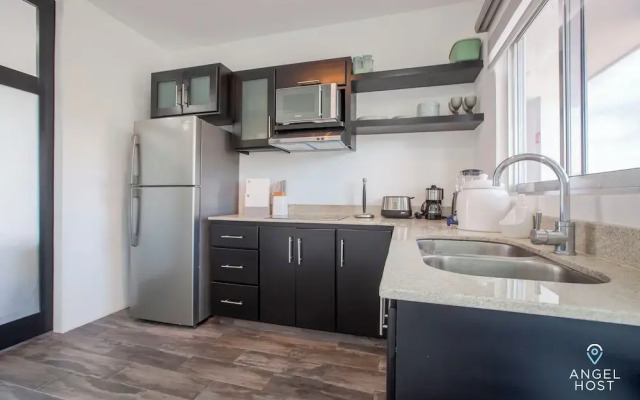 Condos Near Malecon Bay & Sunset Views