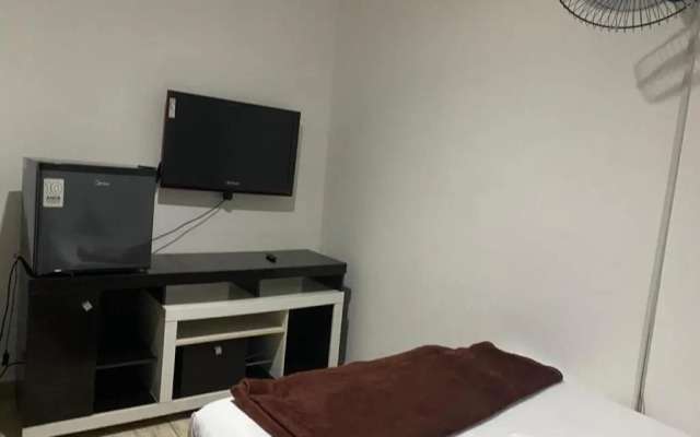 Casa de mãe aconchegante com piscina próximo à praia