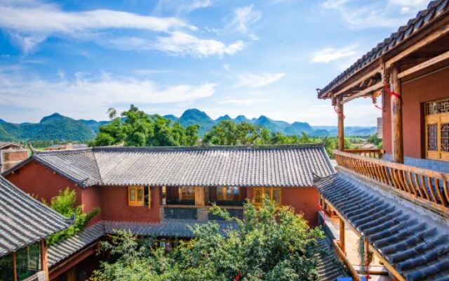 Puzhehei Yidu Homestay (Hehua Daguan Garden)